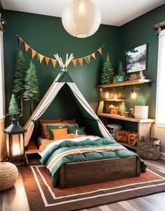 a bedroom decorated in green and orange with a teepee tent on the bed, pine trees