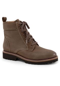 This classic Icara combat boot has a dual lace and zipper closure and a pull tab for an easy wear. The lightweight cushioned footbed allows a fit that is for an everyday use.Leather Upper2mm latex D22 LiningEVA OutsoleSueded Microfiber Footbed1 1/4" Heel height5" Shaft height8" Boot leg circumferenceBoot available in sizes M 6-11 W 6-11 | Wide Width Women's Icara Boot by SoftWalk in Stone (Size 11 W) Casual Lace-up Combat Boots With Zipper, Casual Combat Boots With Zipper Closure, Casual Lace-up Combat Boots With Zipper Closure, Casual Ankle-high Combat Boots With Zipper, Casual Lace-up Moto Boots With Zipper, Casual Brown Combat Boots With Zipper Closure, Fall Cushioned Lace-up Work Boots, Fall Lace-up Work Boots With Cushioned Footbed, Outdoor Lace-up Combat Boots With Zipper Closure