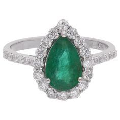 Handcrafted with precision and passion by skilled artisans, this Natural Pear Zambian Emerald Gemstone Cocktail Ring is a true masterpiece of jewelry craftsmanship. Elevate your style with this enchanting piece and revel in the beauty of fine gemstones and exquisite design. The ring is a size 7 US and may be resized to larger or smaller upon request. FOLLOW SPECTRUM JEWELS storefront to view the latest collection & exclusive pieces. Spectrum Jewels is proudly rated as a Top Seller on 1stDibs wit Fine Jewelry Pear-shaped Emerald Ring Vvs Clarity, Green American Diamond Hand-set Jewelry, Luxury Emerald Pear-shaped Jewelry, Luxury Green Diamond Ring, Exquisite Style, Antique Emerald Ring 1stdibs, Zambian Emerald, Jewels Rings, Diamond Cocktail Rings, White Gold Jewelry