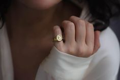 initial signet ring in 10k & 14k solid gold ♡  deep and detailed engraving with your initial   very delicately handcrafted unisex - looks super cool on both men & women the ring has hollow back  material options: 10k gold 14k gold 14k white gold 14k rose gold ring face: 12 x 10 mm  size: we offer sizes from 3 to 13 1/2 for bigger size requests, please send a message ♡ important note about the ring size:   ♡ to be able to make a ring which fits perfectly we kindly ask you to double check your fin Mens Initial Ring, Unisex Looks, Gold Initial Ring, Letter Ring, Gold Signet Ring, 14k Rose Gold Ring, Initial Ring, Gold Initial, Elegant Ring