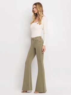 Elevate your wardrobe with these Bella Olive High-Rise Super Flare Jeans. Featuring a flattering high-rise fit, these jeans are designed with a dramatic flare leg for a retro-inspired silhouette. The olive green color adds a unique twist to your denim collection. Pair them with your favorite top for an effortlessly chic look. FABRIC 92% Cotton 6% Polyester 2% Spandex SIZE & FIT Fit is true to size Minimal stretch Model 5'9" wearing size 25 BRAND VERVET Denim Black Date Night Outfit, Vintage Flare Jeans, Super Flare Jeans, Black Dating, Nashville Style, Vintage Flare, Bride Accessories, Flying Monkey, Platform Sandals Heels