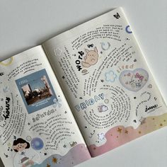 an open children's book with stickers on the pages and pictures in it