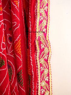 Very beautiful and gorgeous light weight red Georgette tie dye bandhej chunri with zari work. It is decorated with golden flower embroidered lace on all 4 sides. This is a ready to wear dupatta/scarf. It can be used for wedding, wedding rituals, party, bridesmaid gift, lehenga dupatta, Indian functions or events. Dimension: Length: 2 meter Width: 1.2 meter Bandhini Dupatta, Red Bandhani Print Dupatta For Party, Red Bandhani Dupatta, Red Bandhani Print Dola Silk Dupatta, Bohemian Red Dupatta Scarf, Lehenga Dupatta, Modern Christmas Decor, Golden Flower, Wedding Rituals