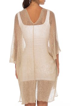 Flowy sheer long mocha kimono cardigan with chic side slits for style and comfort. This versatile open front knit sweater is a great accent over tops, camisoles, blouses, tanks, dresses and swimwear Flattering ¾ length sleeves and naturally ruffled edges add to the stylish silhouette. This feminine duster provides upper arm coverage for sleeveless tanks and dresses. Adds warmth without the bulk A versatile year around shrug that looks fabulous with any outfit. The gentle curved front hem has soft flattering drape. Pair with shorts, jeans, skirts, sundresses. Dress up your beach or poolside look Easy care, easy wear. Hand wash. Lay flat to dry. This soft, stretchy knit never wrinkles, is quick drying and comfortable. Perfect for travel or toss in your bag for a night out BACK FROM BALI crea Beige Open Knit Cover-up, Chic Spring Layering Cover-up, Elegant Stretch V-neck Cardigan, Spring Knit V-neck Cover-up, Chic Beige V-neck Cover-up, Spring V-neck Open Knit Cover-up, Flowy V-neck Cardigan For The Beach, Chic V-neck Shrug For Spring, Fitted Summer Cardigan For Layering