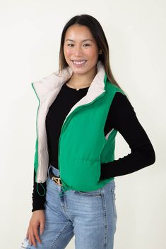 Look your best without sacrificing comfort in this Love Tree Cropped Reversible Puffer Vest for Women in Green/Beige. This reversible vest features a cropped fit for a modern look that's perfect for any occasion. The green and beige colors will make a great addition to your wardrobe. Enjoy the ultimate in fashionable warmth and comfort! Features: Love Tree Style: 5070VY-KELLY Color: Green and Beige 100% Polyester Women’s vest Reversible Center front zipper Puffer design Cropped fit Adjustable wa Trendy Green Vest Outerwear, Sporty Spring Outerwear Vest, Trendy Nylon Spring Vest, Trendy Nylon Vest For Spring, Trendy Spring Nylon Vest, Sporty Green Vest For Spring, Vest For Women, Reversible Vest, Love Tree