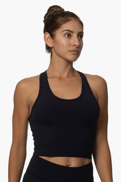 Black Athleisure Tank Top With Built-in Bra And Medium Support, Black Seamless Tank Activewear, Sportswear Tank Top With Built-in Bra For Training, Black Compressive Tank Top For Yoga, Functional Workout Tank Top With Built-in Bra, Black Seamless Tank Top For Pilates, Functional High Stretch Tank Top With Built-in Bra, Black Compressive Tank Top For Pilates, Sporty Tank Activewear With Built-in Bra