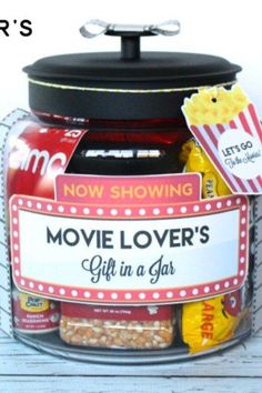 a jar filled with movie lover's gift items