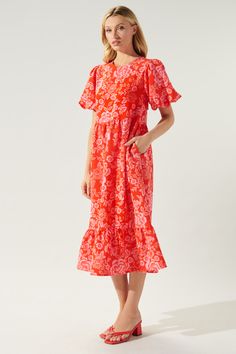 Sunday best calls for this bold, feminine midi. Various floral motifs lay against a bright, red-ground to create the Rhubarb print. It shapes the Papillon dress that features oversized puff sleeves that frame a classic silhouette. A single tier sits at the hem, while the back features a keyhole. Wear it with strappy heels and a floppy hat for a casual modest look.- Puff sleeves- Ruffle tier- Pockets- Keyhole- Color: Red PinkSize + Fit - Model is 5'8" and wearing size XS- Measurements taken from Party Midi Dress, Simple Frocks, Puff Sleeve Midi Dress, Tiered Midi Dress, Midi Dress Party, Puff Sleeve Blouse, Red Midi Dress, Sleeve Midi Dress, 80 Dress