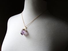 Raw amethyst is a classic in the world of gemstones. It is one of the more affordable stones with the most vibrant natural spectrum of purple tones. I have this necklace in both tiny crystals and large crystals, and a few different chain lengths 💟 **This listing is for only one necklace Each large crystal pendant measures approximately 1 inch in length.💜 Each small amethyst measures between 1/4 and 1/2 inch in length 💜 The chain for ThIs necklace measures 18 inches in length. You can purchase Elegant Amethyst Crystals For Healing, Purple Faceted Amethyst Crystal Necklaces, Purple Faceted Amethyst Crystal Necklace, Spiritual Faceted Amethyst Crystal Necklace, Purple Faceted Crystal Necklaces For Gifts, Purple Pendant Crystal Necklace With Stones, Purple Crystal Pendant Necklace With Stones, Purple Crystal Pendant Necklace, Faceted Amethyst Pendant Crystal Necklace