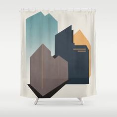 a shower curtain with an abstract design on the front and back of it, featuring buildings