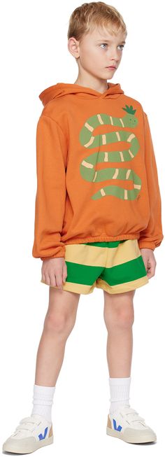 Garment-dyed GOTS-certified organic cotton French terry hoodie. · Graphic printed at front · Elasticized hem and cuffs · Logo flag at side seam · Machine-wash Supplier color: Brown Model measures 48” / 121.9 cm tall and wears size 8. TINYCOTTONS Size: child's height 2: 36 / 92 cm 3: 38.5 / 98 cm 4: 41 / 104 cm 6: 45.5 / 116 cm 8: 50.5 / 128 cm 10: 55 / 140 cm 12: 60 / 152 cm Playful Cotton Sweatshirt With Ribbed Cuffs, Playful Cotton Hoodie With Drawstring Hood, Playful Green Cotton Sweatshirt, Unisex Casual Cotton Hoodie, Cotton Hoodie With Elastic Cuffs For Streetwear, Playful Cotton Sweatshirt For Streetwear, Snake Hoodie, Snake Graphic, Hoodie Graphic