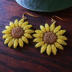 Heart in Hawaii Beaded Sunflower Earrings - Sparkly Yellow Gold Sunflower Adjustable Flower Earrings, Adjustable Gold Sunflower Earrings, Handmade Gold Flower Earrings With Round Beads, Yellow Beaded Earrings With Gold Round Beads, Gold Bead Caps Jewelry For Crafting, Gold Jewelry Bead Caps For Crafting, Adjustable Yellow Earrings With Gold Beads, Gold Beaded Earrings With Bead Caps As Gift, Gold Beaded Flower-shaped Jewelry