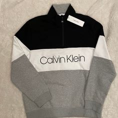 Brand New - Mens Calvin Klein Logo Sweatshirt Size: Mens Usa X-Large Color: Gray, White And Black Colorblock 1/4 Zip; Warm, Soft Touch Fleece Inside Smoke Free, Pet Free Home If You Are New To Poshmark Save $10 Off This Purchase! When You Sign Up, Enter Code: Nana_cherie Calvin Klein Men, Athletic Wear, Zippered Jacket, Sports, Casual Men Athletic Wear, Mens Calvin Klein, Ck Calvin Klein, Logo Sweatshirt, Calvin Klein Men, Zipper Jacket, Athletic Wear, 1/4 Zip, Gray White