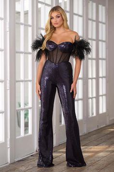 The Ava Presley 39577 Long Sequin Jumpsuit is designed to make you stand out at any formal event. The intricate sequin detailing and sheer corset add an alluring touch, while the feather off-the-shoulder sleeves add a touch of elegance. Perfect for pageants or other formal occasions.  Sizes: 00-16  Colors: Black/AB, Iridescent White, Light Blue Elegant Strapless Jumpsuit With Sweetheart Neckline For Party, Elegant Strapless Jumpsuit With Sweetheart Neckline For Evening, Elegant Jumpsuits And Rompers With Sweetheart Neckline For Party, Glamorous Fitted Strapless Jumpsuit For Gala, Strapless Fitted Jumpsuits And Rompers For Gala, Glamorous Strapless Jumpsuit For Prom, Glamorous Fitted Strapless Jumpsuit For Prom, Fitted Floor-length Strapless Jumpsuit For Evening, Sheer Bodice Corset For Gala