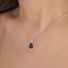 Introducing our exquisite Teardrop Blue Sapphire Solitaire Necklace, a delicate and elegant piece designed for the modern bride. Crafted with meticulous attention to detail, this necklace features a captivating teardrop-shaped blue sapphire, expertly set in a dainty 14K gold pendant. #WomenNecklace #WomenPendant #PearCutNecklace #GemstoneNecklace #DiamondNecklace #SapphireNecklace #DaintyNecklace #MinimalistNecklace #SolitaireNecklace #StatementNecklace #WeddingNecklace #BridalJewelry #GiftHer Sapphire Teardrop Necklace, Elegant Pear-shaped Blue Jewelry, Elegant Blue Teardrop Necklace, Elegant Blue Pear-shaped Jewelry, Elegant Teardrop Birthstone Drop Necklace, Elegant Sapphire Wedding Necklace, Sapphire Drop Necklace For Anniversary, Sapphire Pear-shaped Necklace For Anniversary, Elegant Teardrop Sapphire Necklaces