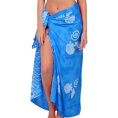 Dress up for a summer luau party in an elegant way with a Blue Sarong! This long blue fabric sarong features white designs of seashells printed on it. You can mix and match this sarong with other tropical-themed attire and accessories to create a unique luau party outfit. Bring the tropical vibes with you wherever you go by wearing this vibrant sarong! Adult Blue Sarong product details:  One size fits most teens and adults Luau Party Outfit, Summer Luau Party, Blue Sarong, Luau Outfits, Luau Party Supplies, Hula Skirt, Unique Outfit, Hawaiian Party, Cover Beachwear