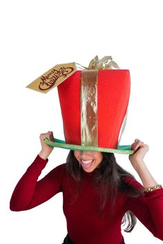 This Christmas Gift Hat will definitely make you stand out at your next Party, Hora Loca, Wedding, Corporate Event, Birthday, Quinceanera, or Halloween Party! It can be used as a wedding hats, top hats, photo booth props, or a party favor. Christmas Party Hats, Christmas Elf Costume, Foam Party, Box Hat, Elf Costume, Christmas Gingerbread House, Halloween Costume Shop, Funny Hats, Costume Themes