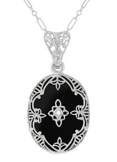 Art Deco Flowers Oval Black Onyx and Diamond Filigree Pendant Necklace in Sterling Silver Art Deco Flowers, Deco Flowers, Art Deco Pendant Necklace, Art Deco Filigree, Light Scattering, Filigree Pendant Necklace, Onyx Pendant, Filigree Necklaces, Filigree Pendant