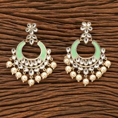 Indo Western Chand Earring with gold plating Height = 82 mm || Width = 65 mm Weight= 9 gms Classic Earring Indo Western Earring Gorgeous kundan, pearls, meenakari contemprory earrings, light weight Highest quality and craftsmanship, Ready to ship from Edison NJ USA Please contact us any questions Green Meenakari Dangle Danglers, Green Earrings For Diwali Celebration, Green Chandelier Earrings For Diwali Gift, Green Earrings For Diwali, Diwali Gift Meenakari Hoop Earrings, Green Dangle Hoop Earrings For Celebration, Green Kundan Dangle Earrings, Kundan Meenakari Hoop Earrings As A Gift, Green Meenakari Dangle Earrings