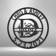 a metal sign that says christ and ashley on the side of a gray wall