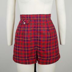 Rare early 1950s Jantzen European fabric plaid cotton shorts ~Red, green, blue, and yellow plaid cotton ~Front button flap lipstick pocket ~Back metal zipper  Hand washed and ready to wear. Condition: Excellent. Wear spot at crotch, faint whitish spot on back and part of zipper has been restitched Size: Marked 10. Fit like a modern XS *please consult measurements to ensure fit Measurements Waist: 25"(top of waistband) / 24.5" (bottom of waistband) Hip: 34.5-35" Rise: 13" Inseam: 2.25" Outseam: 14" Message us with any questions! Sarah Vogt Plaid Cotton Shorts For Daywear, Preppy Fitted Short-length Shorts, Preppy Fitted Shorts With Short Length, Vintage Fitted Shorts, Vintage High Waist Plaid Bottoms, Vintage Fitted Shorts With Short Legs, Plaid High Waist Cotton Shorts, High Waist Plaid Cotton Shorts, Fitted Vintage Plaid Bottoms