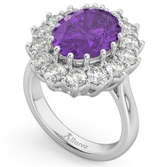 Style Number - AZ16271
This prestigous diamond accented amethyst ring is inspired by the engagement ring worn by Princess Diana and Princess Kate Middleton. This unique and luxurious ring makes a statement with its 12x10mm genuine and natural oval shaped purple amethyst that is complemented by 14 brilliant-cut round near-colorless diamonds of G-H Color, SI Clarity in an oval halo fashion. The purple colored gemstone and clear diamond stones rest on a remarkably stunning platinum band.This Lady D Luxury White Gold Amethyst Ring With Halo Setting, Luxury Amethyst Ring With Halo Setting, Luxury Purple Platinum Rings, Luxury Platinum Amethyst Ring With Brilliant Cut, Luxury Platinum Amethyst Ring With Center Stone, Luxury Purple Amethyst Ring With Halo Setting, Luxury White Gold Amethyst Ring With Brilliant Cut, Luxury Brilliant Cut Amethyst Ring In White Gold, Luxury Lavender Amethyst Ring With Center Stone