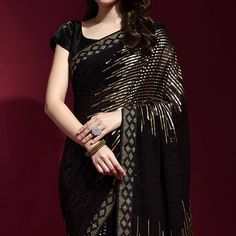 Black & Golden colored saree is made from georgette fabric which is highlighted with beautiful sequins embroidered work as shown. comes along unstitched banglori satin blouse which you can customise as per your design/style. Occasion - You can wear this saree for party and functions. Note:- The actual product may differ slightly in color and design from the one illustrated in the images when compared with computer or mobile screen. Measurements: Saree : Georgette : 5.5 Mtrs Blouse : Georgette : Semi-stitched Black Art Silk Blouse Piece, Black Georgette Pre-draped Saree With Resham Embroidery, Party Pre-draped Saree With Mirror Work In Art Silk, Black Sequined Pre-draped Saree, Embroidered Georgette Pre-draped Saree For Party, Semi-stitched Sequined Saree, Traditional Sequined Saree For Evening, Traditional Evening Saree With Sequins, Traditional Evening Saree In Chinon