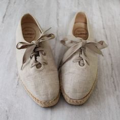 Vintage Easy Spirit espadrilles. Fabric upper, feels and looks like linen. These are so cool, and perfect for a daily summer shoe. It looks like one of the laces is a bit longer than the other, please be aware of this at purchase. Tag size: 8 1/2 D Exterior sole: 10 1/2 inches 3/4 inch sole 3 1/4 inch exterior ball of foot Please note: vintage goods do show natural wear from age, I do my best to show any flaws in the photos, and/or in the listings. Beige Lace-up Shoes For Summer, White Lace-up Shoes For Summer, Summer Lace-up Shoes With Rubber Sole, White Lace-up Shoes With Rubber Sole For Summer, Linen Espadrilles With Woven Sole And Round Toe, Beige Lace-up Espadrilles With Woven Sole, Comfortable Spring Lace-up Shoes With Rubber Sole, Cream Espadrilles With Rubber Sole For Summer, Spring Lace-up Espadrilles With Textured Sole