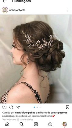 a woman wearing a tiara with flowers in her hair