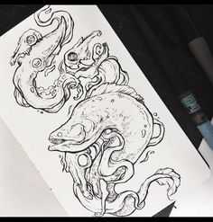 an ink drawing of two octopuses on paper