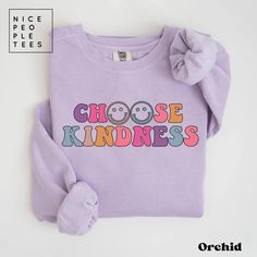 Choose Kindness Sweatshirt, Comfort Colors Sweatshirt, Retro Teacher Shirt, Positive Affirmation Mental Health Self Growth Be Kind Shirt Tee Our graphic sweatshirts are very soft, very cute and bound to keep you warm in the colder months. It's a pre-shrunk, classic fit sweater made with air-jet spun yarn for a soft feel.  ► SHIRT DETAILS The Comfort Colors® sweatshirts are UNISEX - they are meant to have a relaxed fit, please refer to the size chart for more details. Luxurious comfort and style are what this unisex, garment-dyed sweatshirt is all about. It's made with 80% ring-spun cotton and 20% polyester and the fabric is 3-end garment-dyed, ring-spun, color-blast fleece with a 100% cotton face. Each sweatshirt comes with a relaxed fit, a rolled-forward shoulder, and a back neck patch. Purple Cotton Sweatshirt With Graphic Print, Purple Relaxed Fit Sweatshirt With Graphic Print, Purple Relaxed Fit Graphic Print Sweatshirt, Long Sleeve Slogan Shirt In Relaxed Fit, Pink Long Sleeve Shirt With Letter Print, Trendy Long Sleeve T-shirt With Funny Print, Long Sleeve Slogan T-shirt, Funny Print Long Sleeve Relaxed Shirt, Funny Print Long Sleeve Shirt With Relaxed Fit