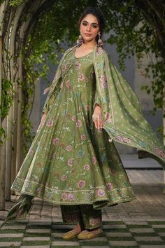 Dark green anarkali with all over floral prints and embroidery work on the hem. Paired with a pant and dupatta with floral prints. - Aza Fashions Dark Green Anarkali, V Neck Anarkali, Floral Print Anarkali, Green Anarkali, A Line Kurta, Luxury Sale, Kurta With Pants, Green Silk, Pants Pattern