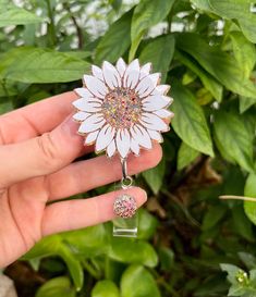 Gold and white sunflower badge reel.  All badge reels are 100% customizable, which includes glitter colors, vinyl colors, names and/or short phrases.  All badge reels are handmade and may contain small flaws including, but not limited to, minor bumps, bubbles, and/or misplaced glitter.  Colors of the actual item may vary to what is shown on the screen due to differences in digital devices.  I do my best to reach as close to perfection as possible before the item is shipped to you. All items are made to order in the sequence that I receive them.  My current turn around time for badge reels is 3-4 weeks before shipping.  If this time frame does not work, please message me and I will do my best to accommodate you.  Please message me for specific requests and ideas! Customizable White Badge Holders For Crafting, Adjustable White Badge Holder As A Gift, Customizable White Badge Reel For Crafting, Personalized White Badge Reel As Gift, Customizable White Badge Reel For Gift, Customizable White Badge Reel, Adjustable Customizable White Badge Holders, Customizable Adjustable White Badge Holders, Handmade Adjustable White Badge Reel