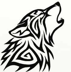 a wolf's head is shown in black and white