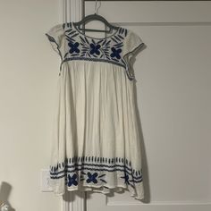 This Is The Best Sundress. The Blue And White Colors Remind Me Of A Trip To Greece! You Could Wear It To Dinner, A Casual Beach Days, Whatever! It’s Such A Perfect Material That Makes It So Comfortable And It Even Had Pockets That Aren’t Noticeable At All When Worn. It’s Flowy And A Medium, However I Am A Small Myself And It Fits Perfectly. So It Could Be For Any Size Due To Its Flowyness. Blue Short Sleeve Dress By Urban Outfitters, Urban Outfitters Blue Short Sleeve Dress, Urban Outfitters White Beach Dress, White Beach Dress From Urban Outfitters, Casual White Urban Outfitters Dress, White Cotton Dresses By Urban Outfitters, White Urban Outfitters Sundress, White Urban Outfitters Dress For Vacation, Urban Outfitters Bohemian Brunch Dresses