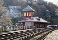 there is a train station on the tracks