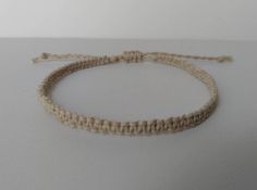 This simple anklet is woven with natural polished hemp. This anklet is adjustable, it measures 8 inches and is adjustable to 11 inches. *This listing is for one hemp anklet.* *With all of my designs I strive for high quality and pay close attention to detail. *Great for casual occasions or going out, also great for a gift for your wife, sister, best friend, etc *Be kind to your hemp jewelry! Care instructions to ensure a longer lasting piece! - Remove your jewelry before sleeping.  - Do not bath Casual Summer Anklet With Adjustable Cord, Handmade Casual Anklets As Gift, Handmade Casual Anklets For Gift, Casual Adjustable Cord Anklet For Summer, Minimalist Adjustable Anklets For Beach, Minimalist Adjustable Beach Anklets, Adjustable Beige Friendship Bracelets For Beach, Casual Adjustable Length Anklets As Gift, Casual Adjustable Anklets