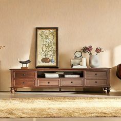 a living room scene with focus on the coffee table and vases in the foreground