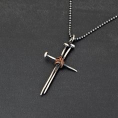 ✈️ Free DHL Express shipping to USA, EU countries & Canada - delivery in just 2 days!    Totally handmade 925 sterling silver oxidized three nails ✝cross pendant necklace with wrapped silver, copper or bronze center cord wire. Symbolizes the 3 holy nails used to crucify Jesus Christ. Please choose the center color from the drop down list!A perfect choice for a lovely 🎁gift as it is delivered inside an elegant branded gift box wrapped with a ribbon & a boutique quality matching paper bag Silver Cross Necklace Woman, Men Cross Necklace, Jewelry Cross Necklace, Cross Necklace Men, Cross Necklace For Men, Cross Necklace Women, Cross Jewelry Necklace, Mens Cross Necklace, Silver Cross Necklace