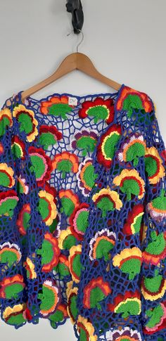 This colorful cardigan is a comfortable choice for any season. It is a ready-made product The cardigan is suitable for sizes S-M-L. Multicolor Cotton V-neck Cardigan, Multicolor V-neck Cotton Cardigan, Bohemian Crochet V-neck Cardigan, Bohemian V-neck Crochet Cardigan, Summer Cotton Knit Cardigan, Oversized Long Sleeve Hippie Cardigan, Summer Crochet Cotton Cardigan, Multicolor Oversized Cardigan For Festivals, Handmade Hippie Cardigan For Spring