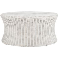 the white wicker coffee table is shown