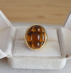 Vintage Designer Ring, Mosaico Pomellato, Pomellato Ring, 18k Gold and citrine ring, vintage fashion ring, woman fashion ring, estate ring, birthday Ring, Citrine Ring, 18k gold, unisex ring, US ring, gift for her, rare vintage ring, Cocktail ring. This is a signed Pomellato Mosaico model ring. This vintage ring is crafted in 18-carat gold and adorned with citrines. The citrines, skillfully cut to create a checkerboard pattern, inspired the name of this ring model. Please note that this model is Formal Fine Jewelry Cabochon Ring, Formal Fine Jewelry Ring With Cabochon, Timeless Cabochon Sapphire Ring Gift, Timeless Gift Sapphire Cabochon Ring, Timeless Cabochon Rings For Formal Occasions, Formal Cabochon Signet Ring, Formal Fine Jewelry Signet Ring With Cabochon, Formal Yellow Gold Oval Cabochon Rings, Formal Yellow Gold Cabochon Sapphire Ring