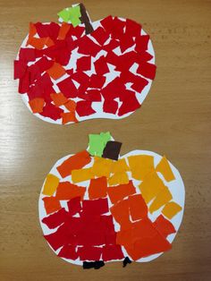 two pieces of paper cut out to look like pumpkins