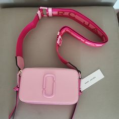 Size: Approximately Approx. 7"(18cm) X 2"(6cm) X 4"(11cm) Shoulder Strap Length: Approximately 97-143 Materials:Cowhide Standardization:Zipper Opening / Inner Side: Separation Layer X 2, Opening Bag X 1 / Outer Side: Opening Bag X 2 Condition:Band New And Never Used,Comes With Dust Bag Snapshot Marc Jacob’s, Mark Jacob’s Bag, Pink Marc Jacobs Bag, Pink Girly Things Accessories, Marc Jacobs Snapshot Bag, Snapshot Bag, Cute Christmas Ideas, Bags Marc Jacobs, Marc Jacobs Crossbody Bag