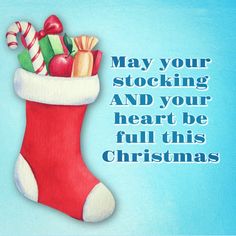 a christmas stocking with candy canes and candies in it on a blue background