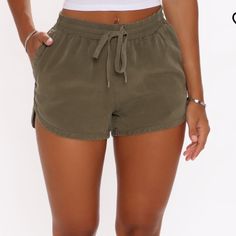 Olive Green Shorts, Elastic Waist, Drawstrings, Pockets, Brand New, Never Worn Khaki Bottoms For Summer Leisure, Khaki Bottoms For Leisure In Summer, Khaki Beach Shorts With Elastic Waistband, Casual Tie-side Bottoms With Tie Waist, Trendy Leisure Shorts With Drawstring, Trendy Drawstring Leisure Shorts, Khaki Drawstring Bottoms Short Length, Khaki Drawstring Bottoms Of Short Length, Casual Vacation Shorts With Tie Waist