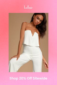 You'll be absolutely irresistible when you're wearing the Lulus Power of Love White Strapless Jumpsuit! Stretch crepe knit shapes a strapless bodice with a fluttering tier, hidden V-bar, and no-slip strips. A high, fitted waist tops relaxed wide leg pants. Hidden back zipper. Fit: This garment fits true to size. Length: Floor length. Size medium measures 56.25" from top to bottom. Inseam: 32.75 Front Rise: 14.25 Bust: Works best for A to C cup sizes - consider sizing up for fuller bust. Waist: Fitted - very fitted at natural waist. Hip: Fitted - stretchy fabric allows room for hips. Undergarments: May be worn with petals, or no bra. Fabric: Fabric is very stretchy. Fully lined. Shell: 96% Polyester, 4% Spandex. Lining: 100% Polyester. Hand Wash Cold. Do Not Bleach. Line Dry. Iron Low Heat. Elegant Strapless Jumpsuit With Sweetheart Neckline For Night Out, Elegant Strapless Jumpsuits And Rompers For Date Night, Strapless Jumpsuits And Rompers For Night Out, Glamorous Strapless Jumpsuits And Rompers For Date Night, Elegant Bandeau Strapless Jumpsuit, Chic Tube Top For Wedding, Chic Wedding Tube Top, Fitted Strapless Flirty Jumpsuits And Rompers, Flirty Strapless Fitted Jumpsuits And Rompers