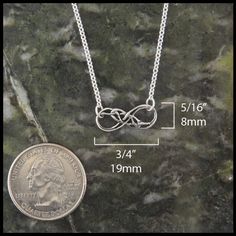 "This delicate Sterling Silver Celtic infinity knot necklace comes with an 16 inch attached chain which makes this necklace a total length of 17\". The infinity knot is a symbol for eternity whether eternal love, eternal life, or a symbol of the continuity of life. This infinity knot pendant features fine strands of celtic knotwork within the bands of the infinity. Perfect for wearing on its own or as part of a layered set. Each piece is cast using the lost wax method and hand finished in our An Adjustable Sterling Silver Infinity Necklace, Adjustable Nickel-free Infinity Necklace, Celtic Eternity Knot, Celtic Infinity Knot, Eternity Knot, Thistle Earrings, Celtic Knot Necklace, Celtic Pendant, Celtic Necklace