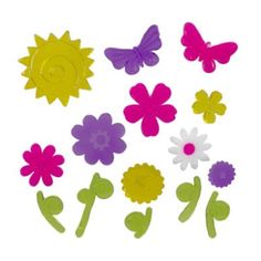 various flowers and butterflies are shown in the shape of magnets on a white background