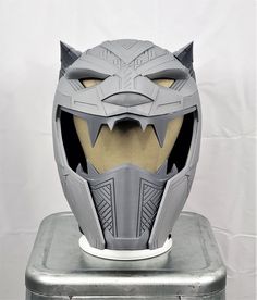 the helmet is designed to look like a cat's head